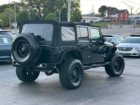 Used 2013 Jeep Wrangler Unlimited Sport AWD/4WD image 2