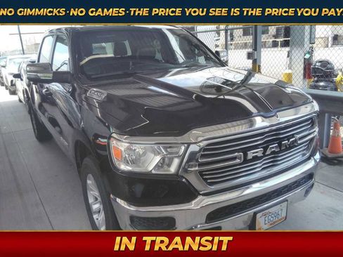 Used 2024 RAM 1500 Laramie AWD/4WD image 1