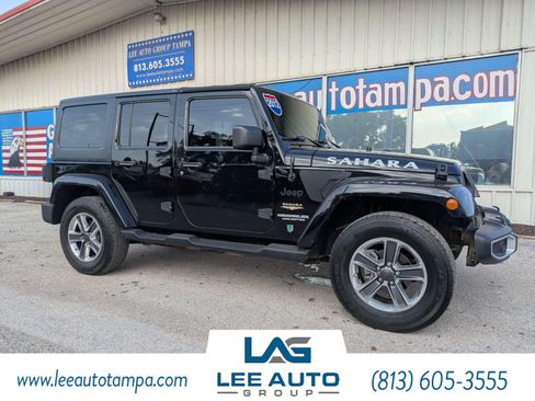 Used 2012 Jeep Wrangler Unlimited Sahara AWD/4WD image 1