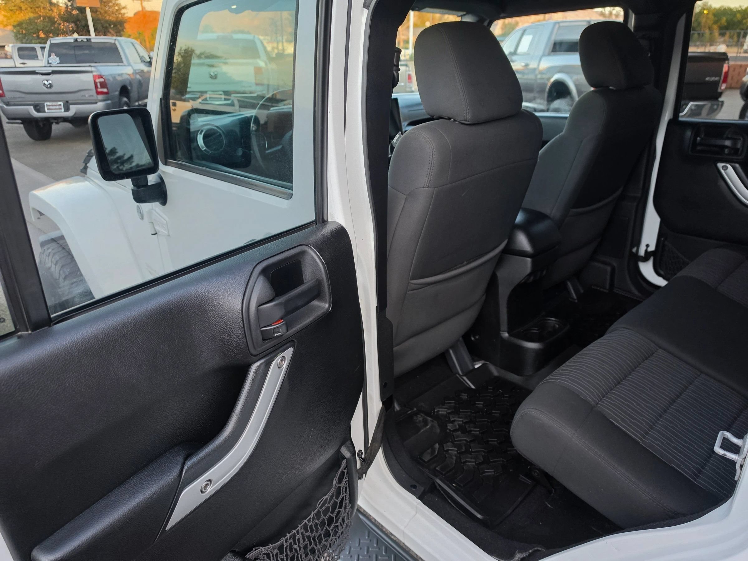 Used 2012 Jeep Wrangler Unlimited Sahara w/ Dual Top Group AWD/4WD image 17