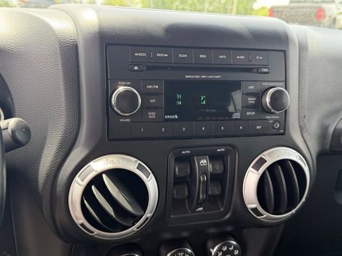 Used 2014 Jeep Wrangler Unlimited Sahara AWD/4WD image 22