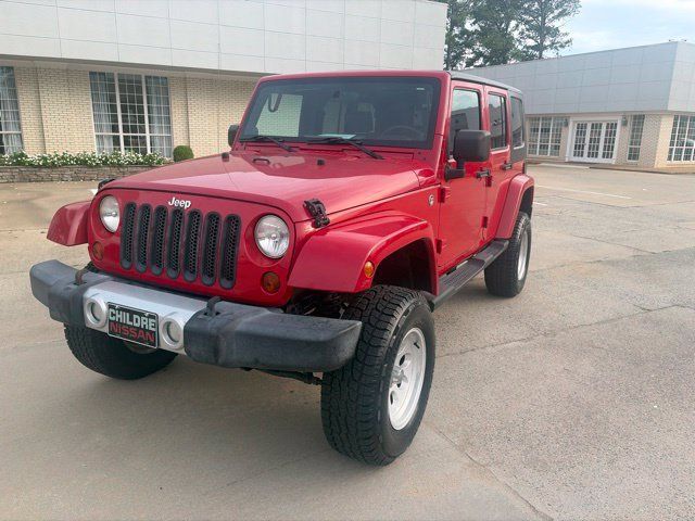 Used 2010 Jeep Wrangler Unlimited Sahara w/ Dual Top Group AWD/4WD image 2
