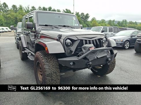 Used 2016 Jeep Wrangler Unlimited Sahara AWD/4WD image 1