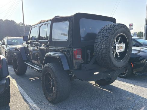 Used 2014 Jeep Wrangler Unlimited Sahara w/ Max Tow Package AWD/4WD image 6