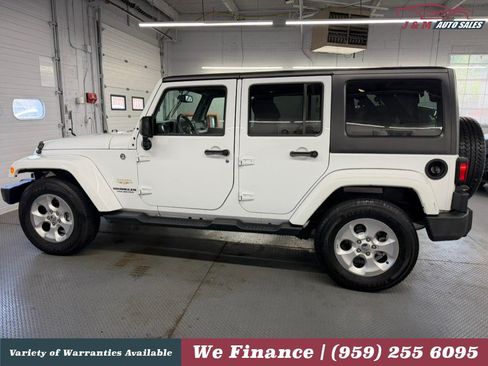 Used 2015 Jeep Wrangler Unlimited Sahara w/ Dual Top Group AWD/4WD image 12
