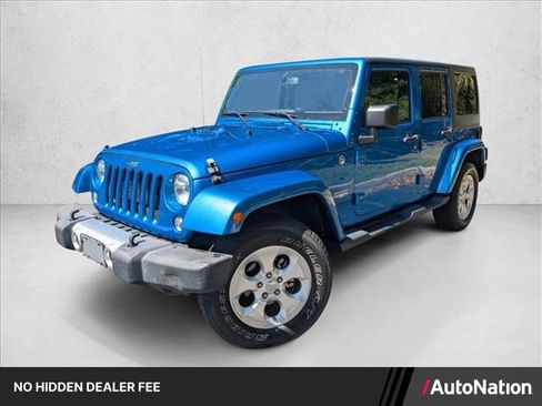 Used 2015 Jeep Wrangler Unlimited Sahara w/ Max Tow Package AWD/4WD image 1