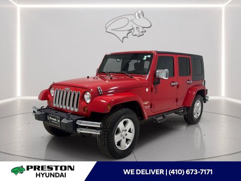 Used 2010 Jeep Wrangler Unlimited Sahara w/ Mopar Chrome Edition Group AWD/4WD image 1