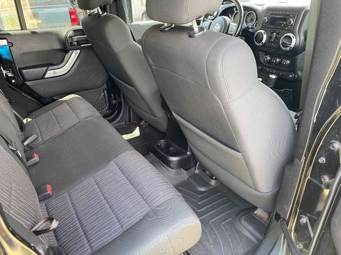 Used 2012 Jeep Wrangler Unlimited Sahara w/ Dual Top Group AWD/4WD image 21