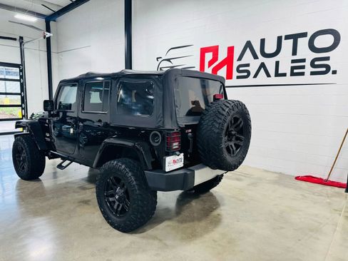 Used 2012 Jeep Wrangler Unlimited Sahara w/ Max Tow Pkg image 2