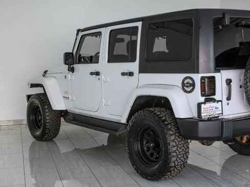 Used 2014 Jeep Wrangler Unlimited Sahara w/ Dual Top Group AWD/4WD image 48
