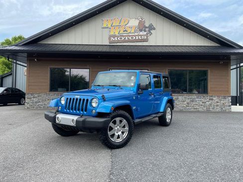 Used 2015 Jeep Wrangler Unlimited Sahara w/ Connectivity Group AWD/4WD image 1