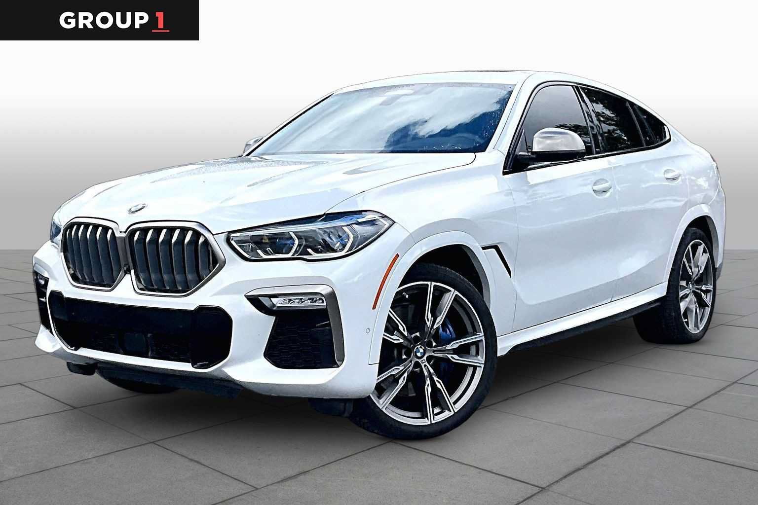 Used 2021 BMW X6 M50i w/ Executive Package AWD/4WD image 1