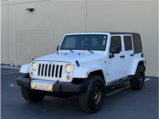 Used 2014 Jeep Wrangler Unlimited Sahara w/ Connectivity Group AWD/4WD video 1