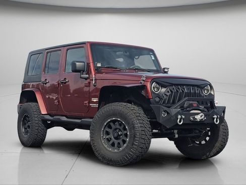 Used 2010 Jeep Wrangler Unlimited Sahara w/ Dual Top Group AWD/4WD image 2