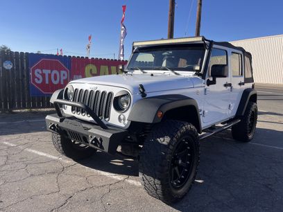 Used 2016 Jeep Wrangler Unlimited Sport