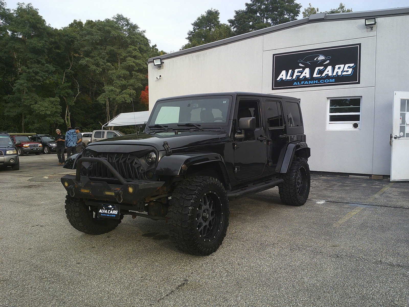 Used 2016 Jeep Wrangler Unlimited Sahara w/ Dual Top Group AWD/4WD image 1