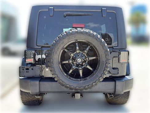 Used 2012 Jeep Wrangler Unlimited Sahara w/ Mopar Chrome Edition Group AWD/4WD image 4