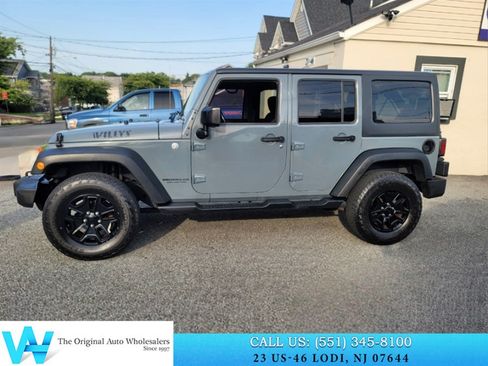 Used 2015 Jeep Wrangler Unlimited Sport w/ Dual Top Group AWD/4WD image 8