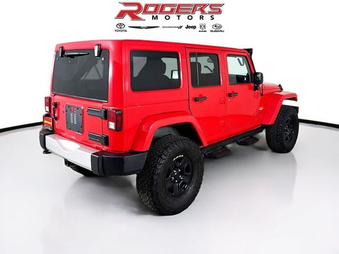 Used 2013 Jeep Wrangler Unlimited Sahara w/ Dual Top Group AWD/4WD image 8