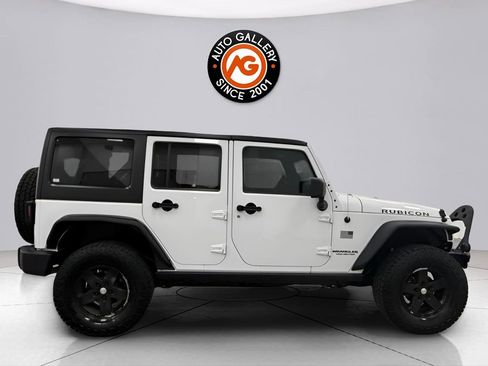 Used 2012 Jeep Wrangler Unlimited Rubicon w/ Dual Top Group AWD/4WD image 8