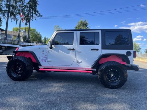 Used 2012 Jeep Wrangler Unlimited Sport AWD/4WD image 9