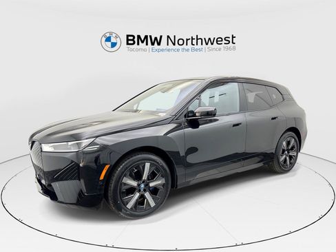 Used 2024 BMW iX xDrive50 w/ Premium Package AWD/4WD image 1