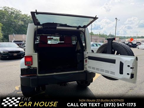 Used 2013 Jeep Wrangler Unlimited Sahara w/ Dual Top Group AWD/4WD image 17