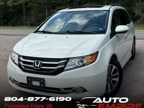 Used 2014 Honda Odyssey Touring image 1