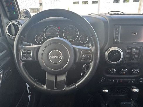 Used 2014 Jeep Wrangler Unlimited Sahara w/ Mopar Chrome Edition Group AWD/4WD image 13