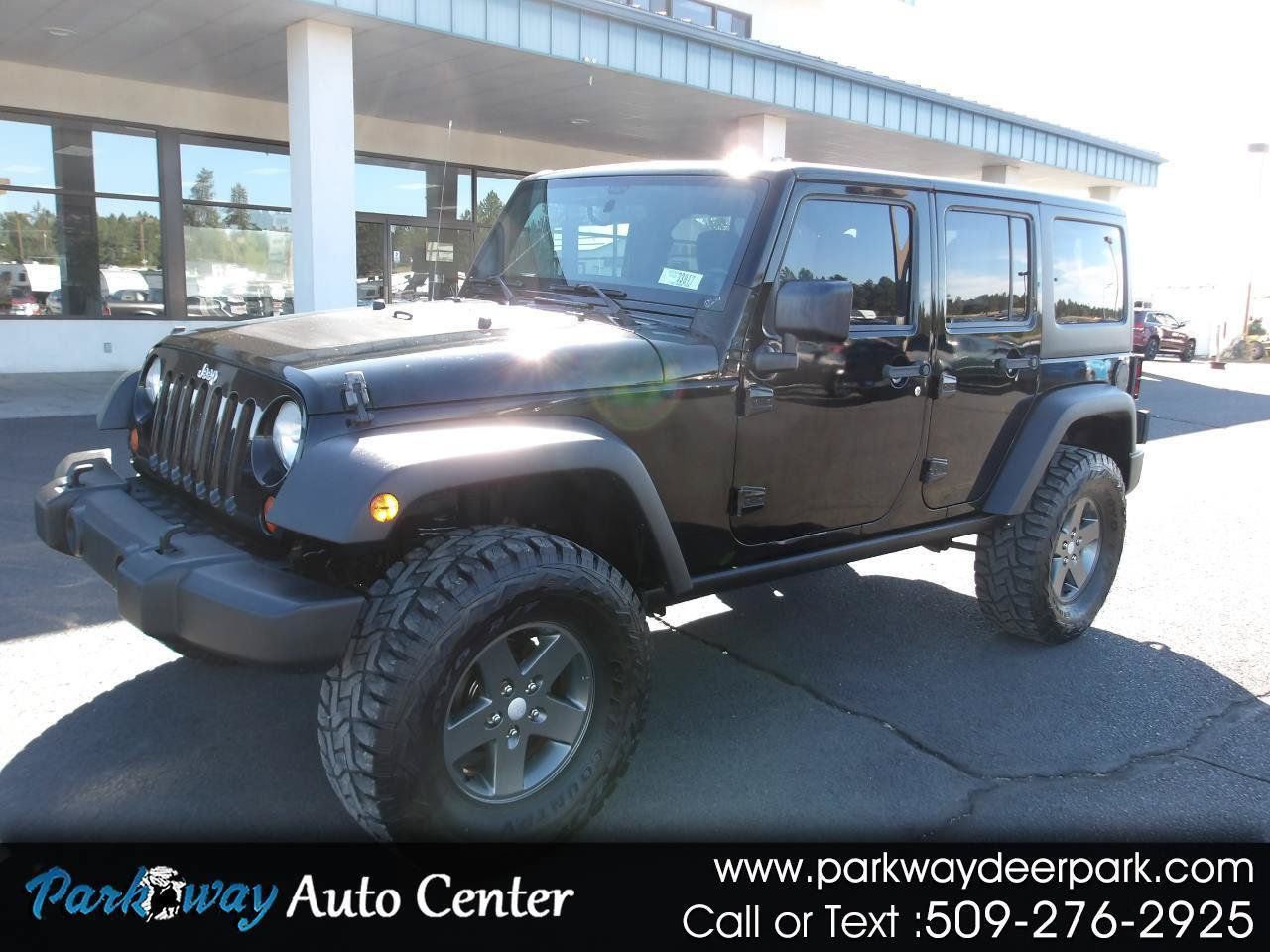 Used 2011 Jeep Wrangler Unlimited Rubicon w/ Dual Top Group AWD/4WD image 1