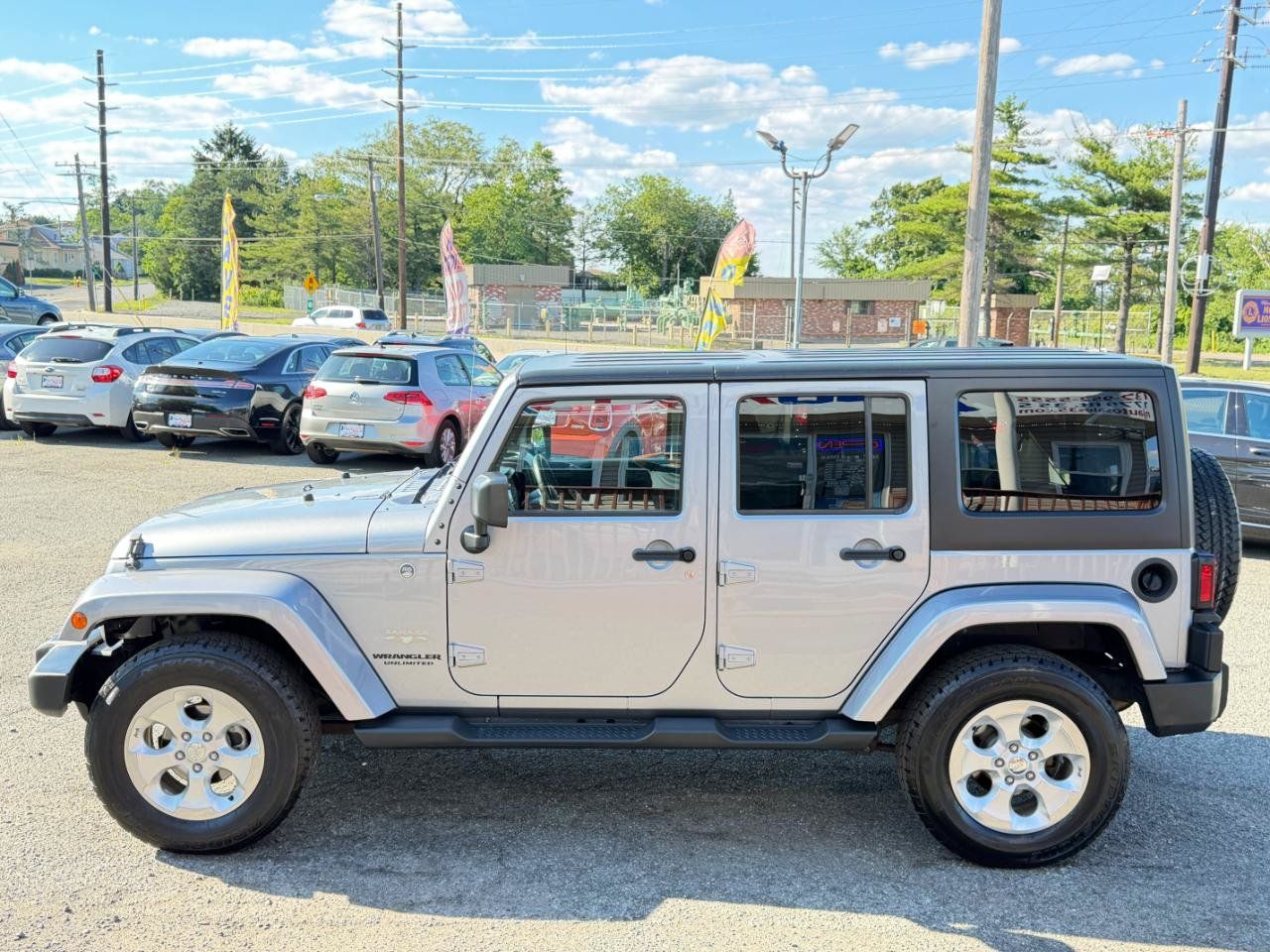 Used 2015 Jeep Wrangler Unlimited Sahara w/ Dual Top Group AWD/4WD image 7