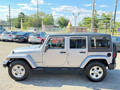 Used 2015 Jeep Wrangler Unlimited Sahara w/ Dual Top Group AWD/4WD image 7