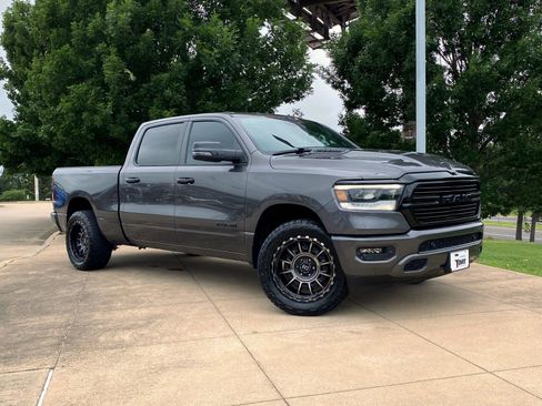 Used 2024 RAM 1500 Laramie AWD/4WD image 1