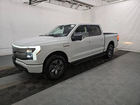 Certified 2023 Ford F150 Lightning XLT w/ Equipment Group 312A High image 1