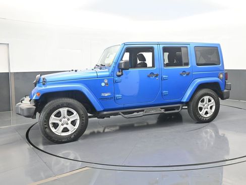 Used 2015 Jeep Wrangler Unlimited Sahara w/ Dual Top Group image 2