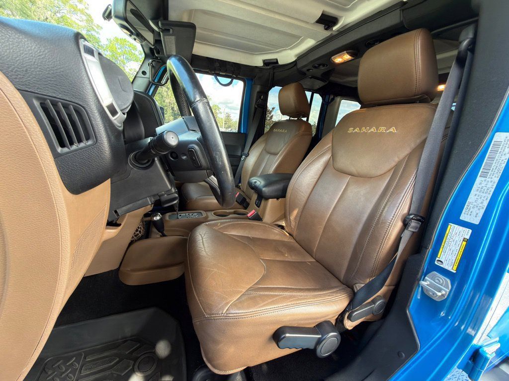 Used 2015 Jeep Wrangler Unlimited Sahara w/ Dual Top Group AWD/4WD image 12