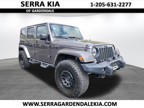 Used 2016 Jeep Wrangler Unlimited Sahara image 1