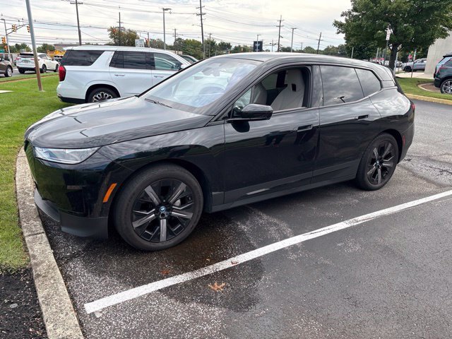 Used 2024 BMW iX xDrive50 w/ Premium Package AWD/4WD image 1