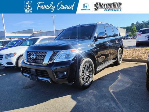Used 2019 Nissan Armada Platinum w/ Captain's Chairs Package RWD image 1