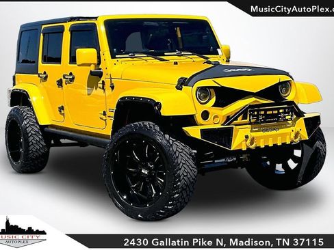 Used 2011 Jeep Wrangler Unlimited Sport AWD/4WD image 1