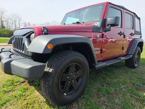 Used 2011 Jeep Wrangler Unlimited Sport w/ PWR Convenience Group image 1