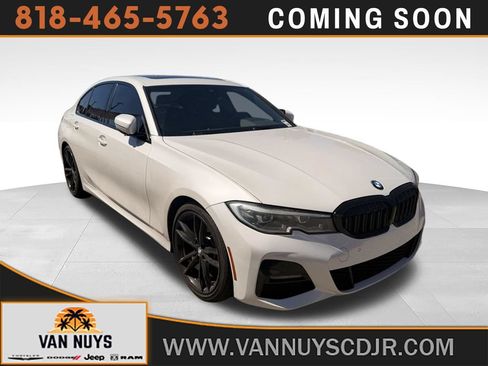 Used 2022 BMW 330i Sedan w/ M Sport Package RWD image 1