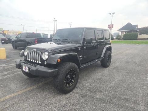 Used 2018 Jeep Wrangler Unlimited Sahara AWD/4WD image 1