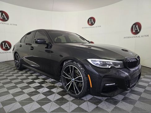 Used 2021 BMW 330i xDrive Sedan w/ M Sport Package image 1