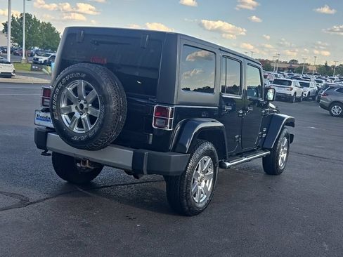 Used 2013 Jeep Wrangler Unlimited Sahara w/ Dual Top Group AWD/4WD image 7