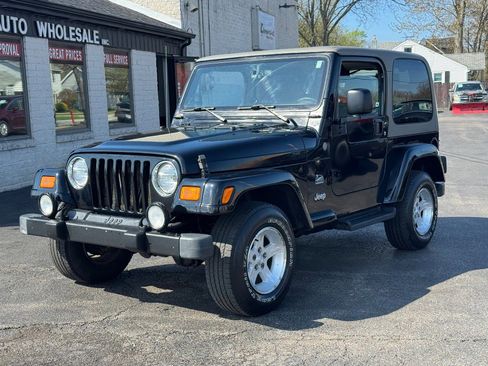 Used 2004 Jeep Wrangler Sahara w/ Dual Top Group AWD/4WD image 1