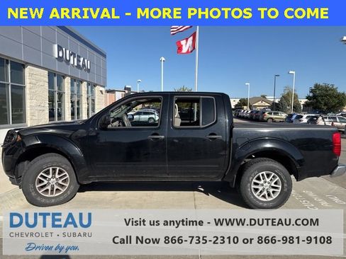 Used 2014 Nissan Frontier SV image 1