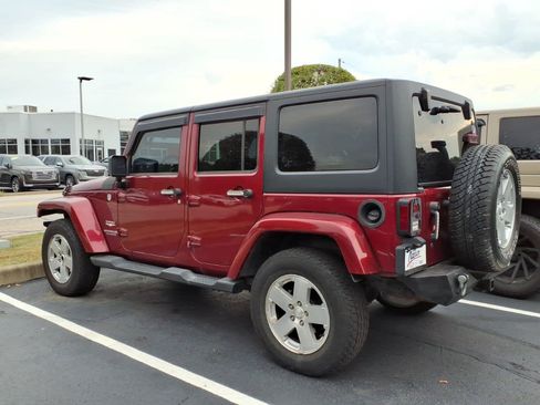 Used 2012 Jeep Wrangler Unlimited Sahara w/ Dual Top Group AWD/4WD image 4