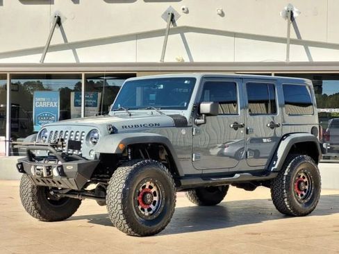 Used 2014 Jeep Wrangler Unlimited Rubicon w/ Dual Top Group AWD/4WD image 3