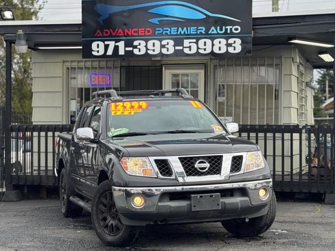Used 2011 Nissan Frontier SL w/ Moonroof Pkg image 1